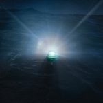 Electronic boat flare in water at night